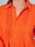 Long sleeve button up tunic blouse in orange ￼