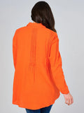 Long sleeve button up tunic blouse in orange ￼