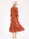 3/4 ruffle sleeve front pockets, ruffle bottom hem, loose fit maxi dress in rust ￼